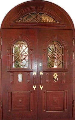 Стальная арочная дверь со стеклом и ковкой ДА-30 в дом из кирпича в Коломне