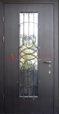 Остекленная стальная дверь с ковкой ДСК-26 в Талдоме