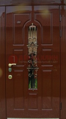 Красивая металлическая дверь со стеклом и ковкой ДСК-33 в Коломне
